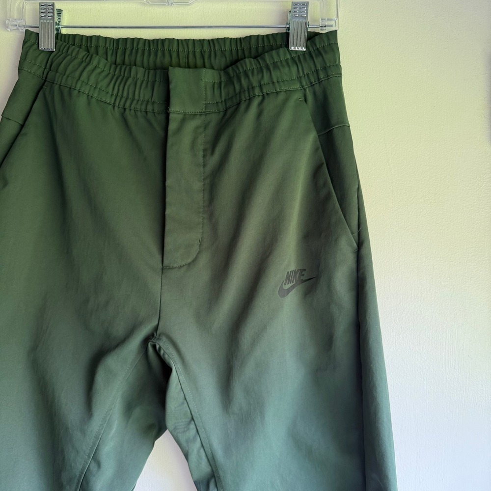 Nike Womens Tech Essentials Woven Tapered Pants Dark Green Olive XS - Picture 2 of 8